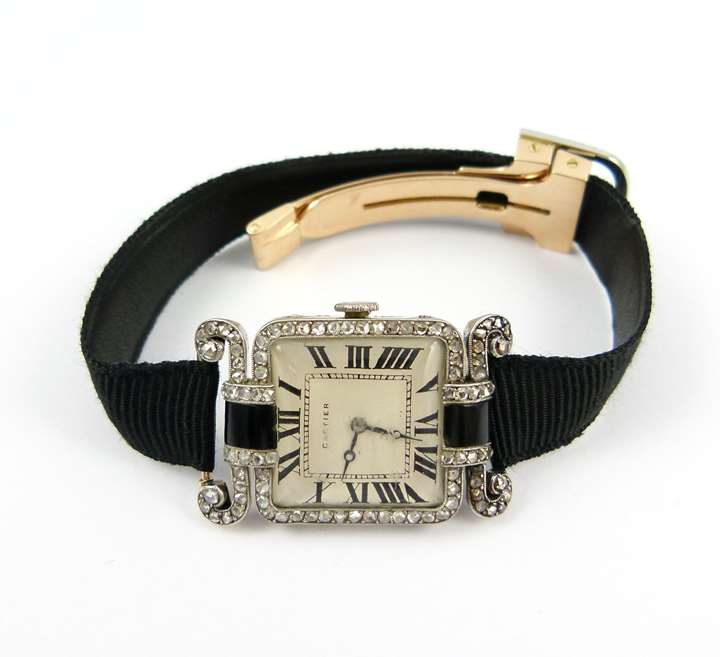Diamond and onyx lady's wristwatch with Chinoiserie shoulders